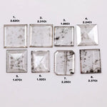 Square step-cut lab grown diamond with beveled edges and geometric faceting, loose ethical man made diamond for engagement ring or custom fine jewelry setting displayed on white background.