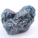 raw diamond ore and natural raw diamonds in rough rock formation blue rough diamond