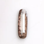 brown color diamond ring with sapphire baguettes