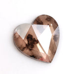 brown color gold heart necklace with diamond in the middle