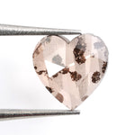 brown color gold heart necklace with diamond in the middle