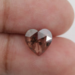 brown color gold heart necklace with diamond in the middle