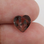 brown color gold heart necklace with diamond in the middle