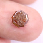 natural red color asscher cut diamond, brown diamond necklace, brown diamond price, 2ct asscher cut diamond ring, raw brown diamond, and princess cut natural diamond engagement ring.