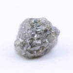 raw uncut diamond engagement ring with natural rough diamond texture grey rough diamond