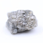 real raw diamond stone with natural rough crystal texture before cutting grey rough diamond