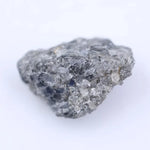 Loose rough diamonds assortment for collectors and designers.Radiant cut loose diamond ready for custom engagement ring.