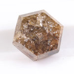 Earth-mined natural brown diamond stone photographed in high resolution, showing real color saturation and natural structure.