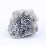 Rustic grey diamond gemstone with storm gray tone and natural inclusions.