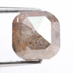 Natural brown diamond engagement ring featuring cushion cut design and genuine earth-mined stone. This image represents luxury, rarity, and emotional value