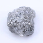 Natural raw diamond with organic shape and textures, showcasing earthy elegance and charm.