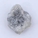 Raw diamond stone with natural crystalline patterns and authentic unpolished charm.