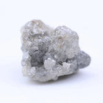 Natural rough diamond stone with original crystal edges and untreated raw gemstone appearance