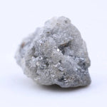 Natural rough diamond stone with original crystal edges and untreated raw gemstone appearance