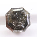 Authentic natural diamond crystal photographed to show natural inclusions and growth patterns. This image educates buyers on how to tell natural diamonds from lab grown diamonds