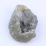 Uncut natural diamond stone with strong crystal edges and raw sparkle in natural light