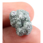 Blue rough diamond in natural uncut form featuring irregular diamond structure and raw texture. This loose diamond stone is ideal for fine jewelry designers, gemstone collectors, and those searching for natural diamond material for unique ring creations.