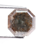 Natural diamond ring featuring uncut and polished elements, highlighting what colors diamonds come in naturally.
