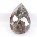 Pear cut natural diamond set in a real natural diamond ring, showcasing precision cutting and natural brilliance.