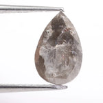 Pear cut natural diamond set in a real natural diamond ring, showcasing precision cutting and natural brilliance.
