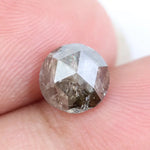 round cut natural diamond ring and round natural diamond grey-brown colored diamond