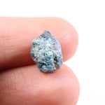 loose rough diamonds and large raw gemstones with natural crystal texture blue rough diamond