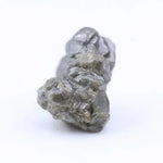Natural grey diamond loose stone with raw texture and smoky charcoal tone for custom engagement ring design.