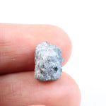 loose rough diamonds and large raw gemstones with natural crystal texture blue rough diamond