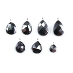 natural pear cut diamond black diamond what is a black diamond, diamond ring, how to tell if a diamond is real, lab grown vs natural diamond, raw diamonds, man made diamonds, GIA certified diamonds, buy loose diamonds.