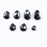 natural pear cut diamond black diamond what is a black diamond, diamond ring, how to tell if a diamond is real, lab grown vs natural diamond, raw diamonds, man made diamonds, GIA certified diamonds, buy loose diamonds.