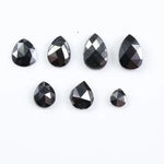 natural pear cut diamond black diamond what is a black diamond, diamond ring, how to tell if a diamond is real, lab grown vs natural diamond, raw diamonds, man made diamonds, GIA certified diamonds, buy loose diamonds.