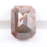 Natural diamond in raw and polished form displaying true earth-mined characteristics. This diamond highlights natural inclusions, clarity variations