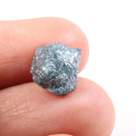 uncut diamond engagement ring with large rough diamond crystal design blue rough diamond