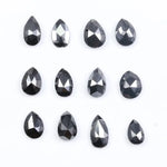 Natural Pear Cut Fancy Black Diamond Engagement Ring, how can you tell if a diamond is real, diamonds in the rough, raw diamonds, lab grown vs natural diamond, natural diamond vs lab grown.