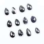 Natural Pear Cut Fancy Black Diamond Engagement Ring, how can you tell if a diamond is real, diamonds in the rough, raw diamonds, lab grown vs natural diamond, natural diamond vs lab grown.