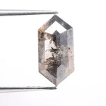 Collection of natural diamonds including oval, elongated cushion, and Dutch marquise cuts. Shows real diamonds formed deep within the earth