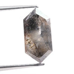 Collection of natural diamonds including oval, elongated cushion, and Dutch marquise cuts. Shows real diamonds formed deep within the earth