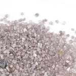 pink natural rough diamond with uncut raw surface for jewelry design