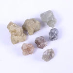 rough uncut diamond, smooth diamonds, how to tell natural vs lab diamond, is lab grown diamond better than natural, black faceted diamond