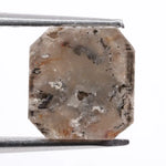 Rough natural diamond shown in its raw uncut form, revealing authentic crystal structure formed over billions of years.