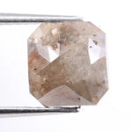 Rough natural diamond shown in its raw uncut form, revealing authentic crystal structure formed over billions of years.