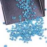 raw uncut diamond showing what does diamond look like before it is cut with natural blue diamond blue diamond stud earrings and blue diamond wedding band black faceted diamond