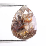 Natural diamond jewelry including rings, earrings, and bracelets displayed to explain price differences between natural and lab grown diamonds.