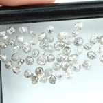 Natural grey white rough diamond lot with mixed silver smoky tones, raw uncut loose diamond crystals displayed on white background.