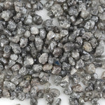 grey earth mined diamond with a natural uncut rough surface for jewelry making