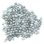 Mixed silver smoky raw uncut loose diamond crystals in natural grey and translucent white tones, rough earth-mined diamonds for jewelry making.
