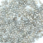 Natural gray silver diamond rough crystal with metallic shine and raw uncut texture