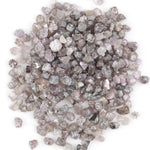natural pink raw diamond with an unpolished rough surface for jewelry design