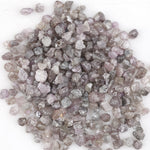 natural pink raw diamond with an unpolished rough surface for jewelry design