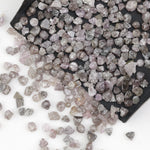 natural pink raw diamond with an unpolished rough surface for jewelry design